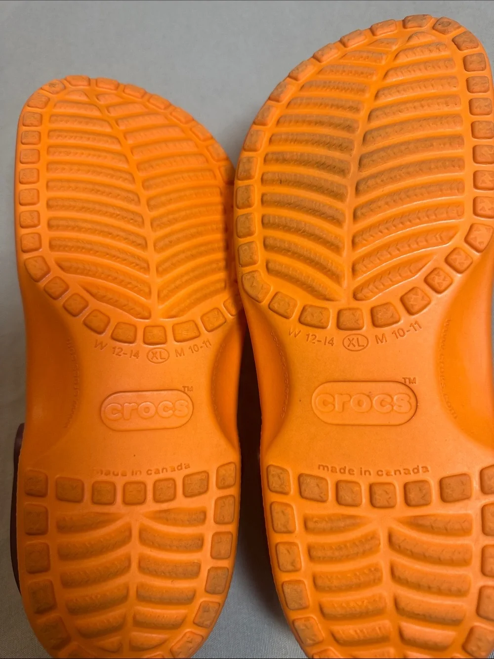 Men’s Orange Crocs Sandals with a Virginia Tech Maroon Strap